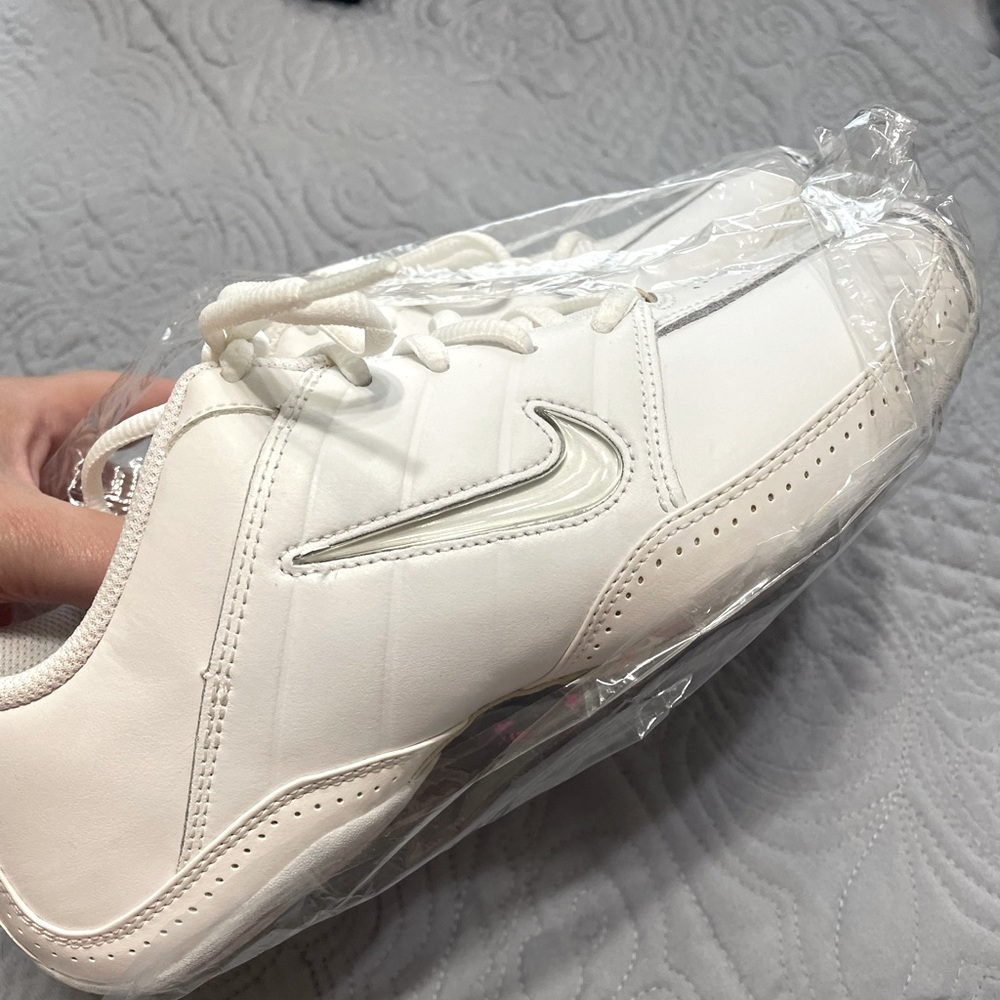 White! Never worn Nike cheer shoes size 7, no box